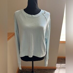 Women’s Sweaty Betty crew neck light blue pull over lounge sweatshirt. Size 8